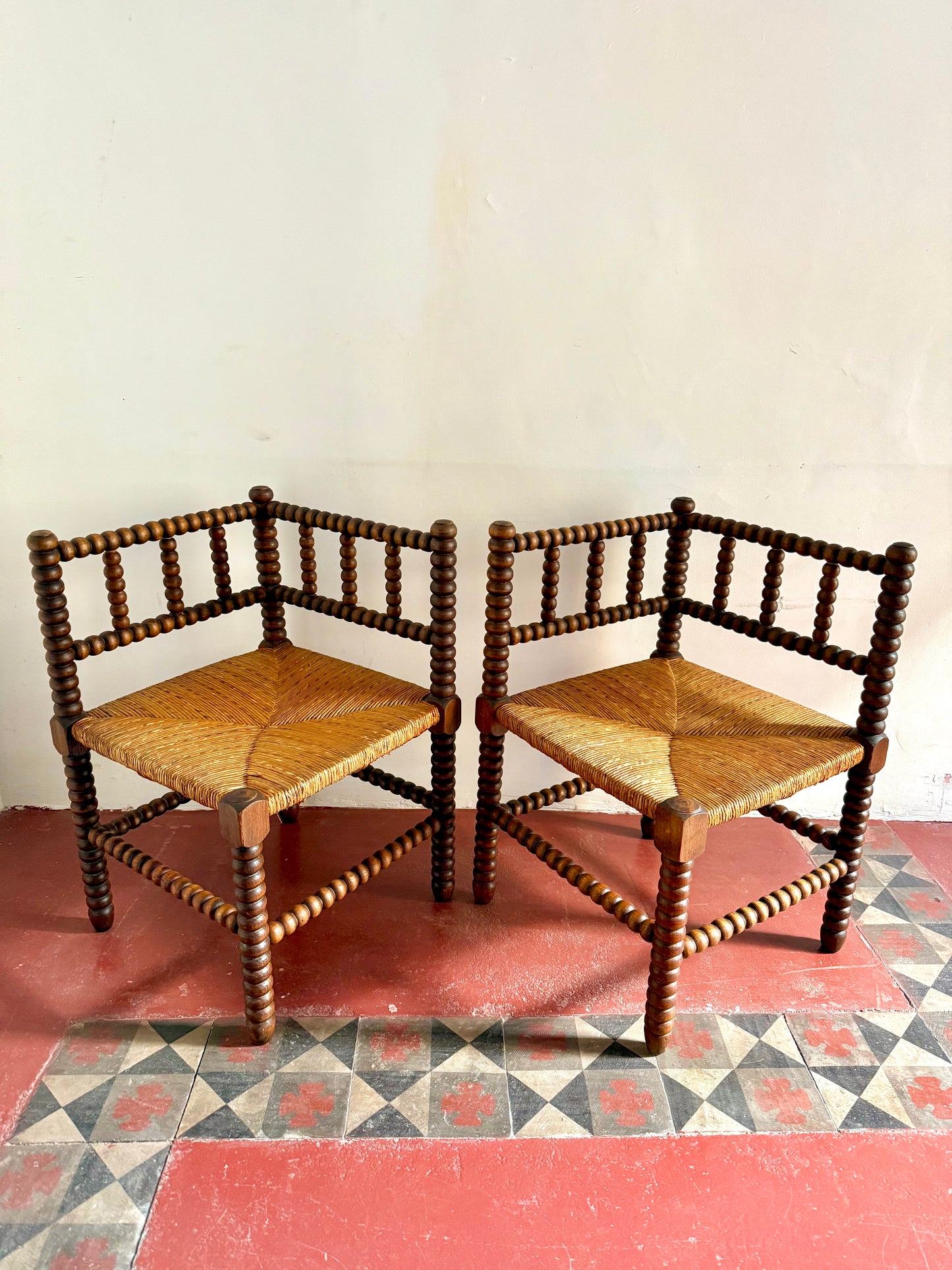 Pair Of Early C20th French bobbin corner chairs