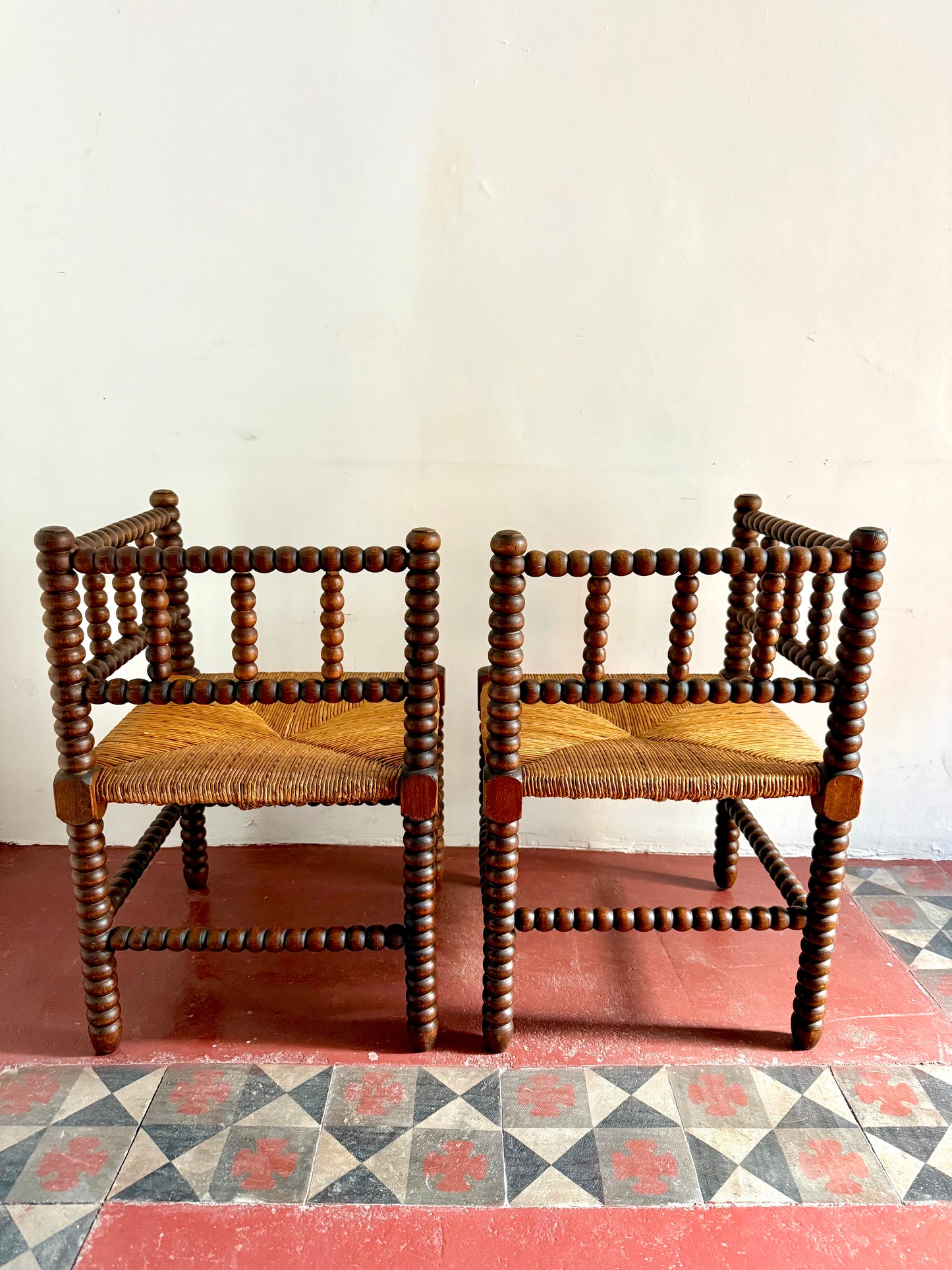 Pair Of Early C20th French bobbin corner chairs