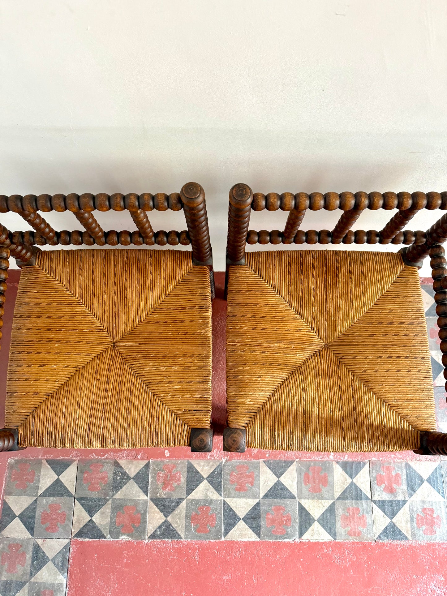 Pair Of Early C20th French bobbin corner chairs